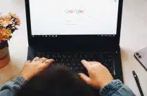 person using black laptop computer