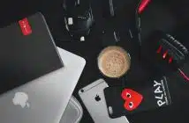 silver iPhone 6s near cup and MacBook